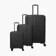 Tre sorte Travelite Air Stripe-kufferter med lodrette riller og udtrukne håndtag